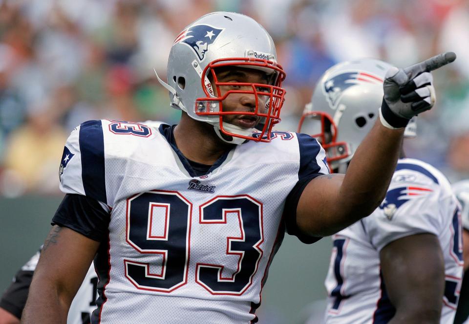 The Patriots' Richard Seymour reacts after sacking  Jets quarterback Brett Favre during a game in 2008.