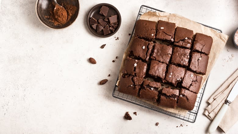 sliced chocolate brownies on a white surface