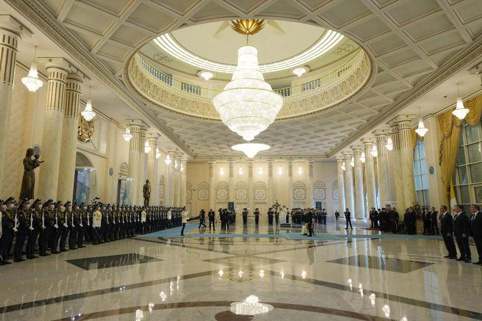 Pope Francis attends with Kazakhstan's President Kassym-Jomart Tokayev the welcome ceremony at the Presidential Palace Ak Orda, in Nur-Sultan, Kazakhstan, Tuesday, Sept. 13, 2022. Pope Francis begins a 3-days visit to the majority-Muslim former Soviet republic to minister to its tiny Catholic community and participate in a Kazakh-sponsored conference of world religious leaders. (AP Photo/Andrew Medichini)