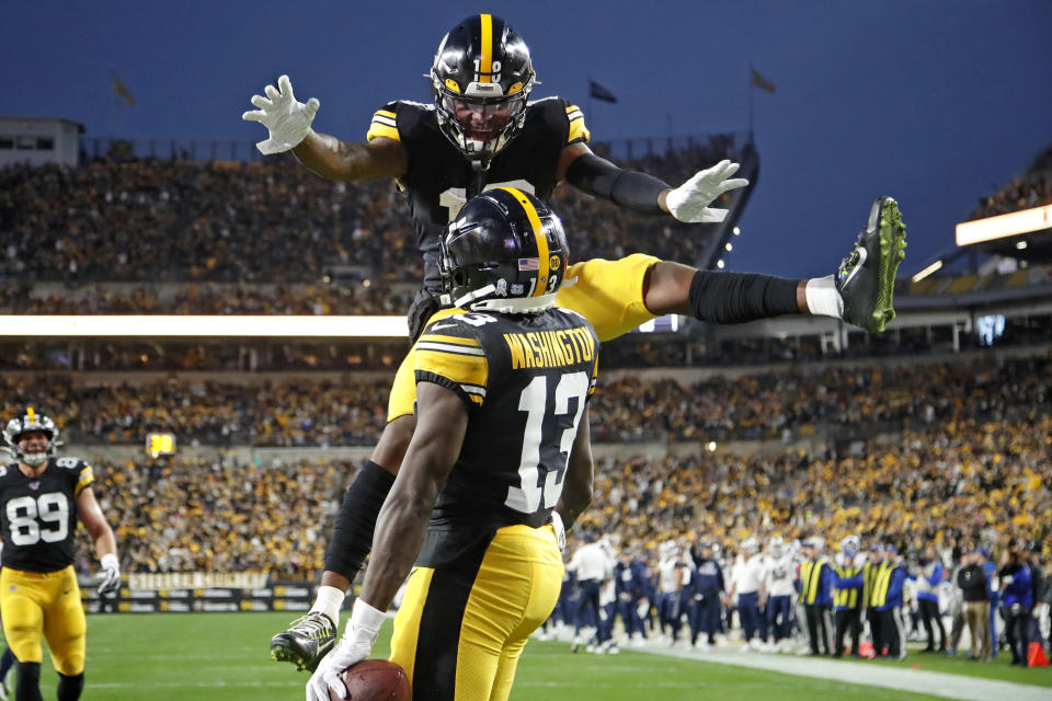 Pittsburgh Steelers wide receiver James Washington (13) celebrates his touchdown catch with Diontae Johnson (18) during the first half of an NFL football game against the LoLos Angeles Rams in Pittsburgh, Sunday, Nov. 10, 2019. (AP Photo/Don Wright)