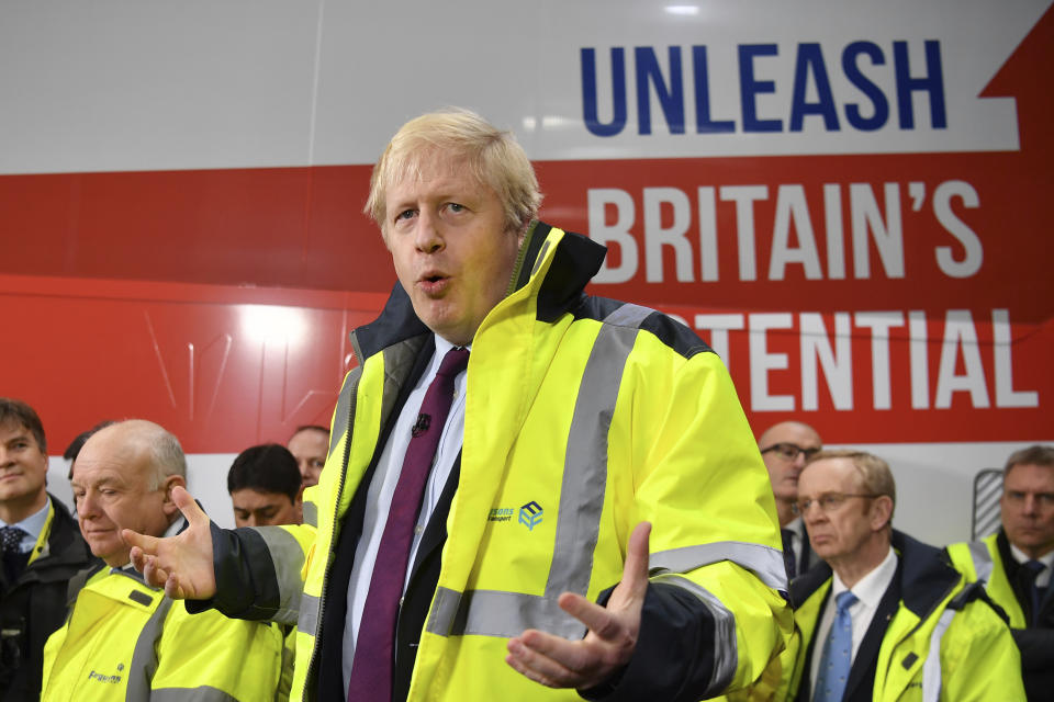 Britain's Prime Minister Boris Johnson talks during a question and answer session, part of a General Election campaign visit to Ferguson's Transport in Washington, England, Monday, Dec. 9, 2019. Britain goes to the polls on Dec. 12. (Ben Stansall/Pool Photo via AP)