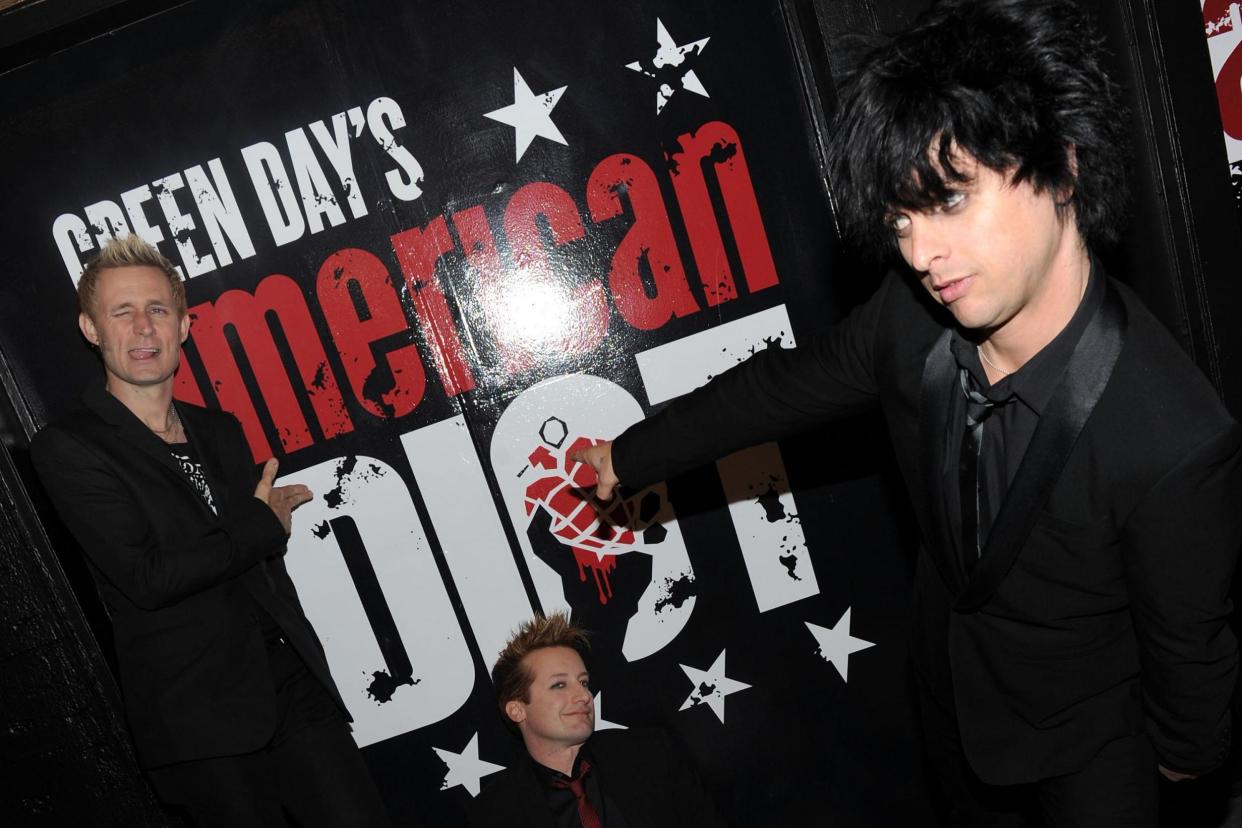 Green Day's hit song "American Idiot" has been climbing up the charts ahead of Donald Trump's visit: Getty Images