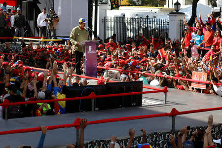 FILE PHOTO: Venezuela's President Nicolas Maduro (C) speaks during a rally to commemorate the 26th anniversary of late Venezuelan President Hugo Chavez failed coup attempt in Caracas, Venezuela February 4, 2018. REUTERS/Marco Bello