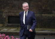 FILE - British MP Michael Gove arrives at 10 Downing Street, in London, Sept. 15, 2021. British Prime Minister Boris Johnson made a cabinet reshuffle on Wednesday. Revelations that Prime Minister Boris Johnson and his staff partied while Britain was in a coronavirus lockdown have provoked public outrage and led some members of his Conservative Party to consider ousting their leader. If they manage to push Johnson out — or if he resigns — the party would hold a leadership contest to choose his replacement. Gove, a party heavyweight, has held many key Cabinet posts and is currently in charge of delivering on the government’s promise to “level up” Britain, that is, address inequality by increasing opportunities in deprived areas. (AP Photo/Alberto Pezzali, File)