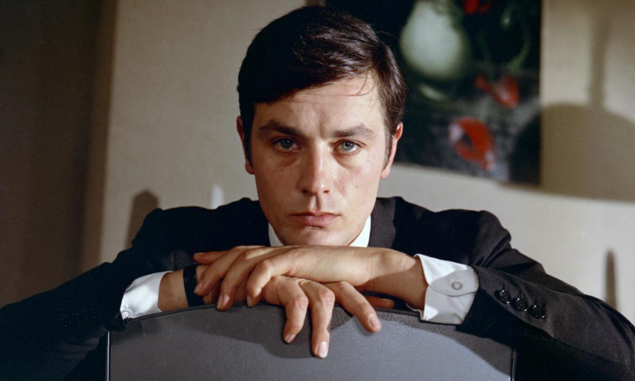 <span>Alain Delon on the set of Le Samourai in 1968.</span><span>Photograph: Sunset Boulevard/Corbis via Getty Images</span>