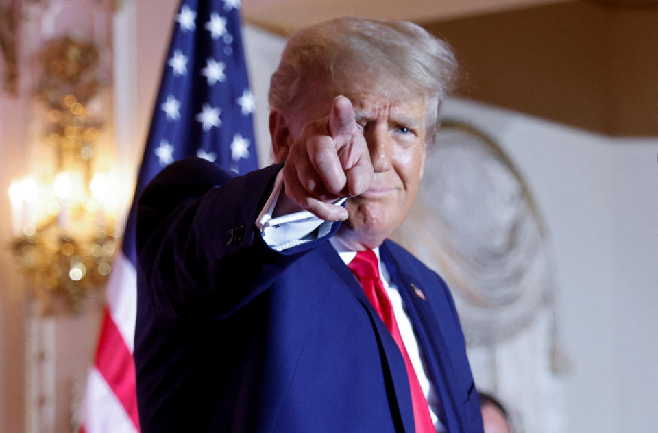 Former U.S. President Donald Trump points as he announces that he will once again run for U.S. president in the 2024 U.S. presidential election during an event at his Mar-a-Lago estate in Palm Beach, Florida, U.S. November 15, 2022. REUTERS/Jonathan Ernst