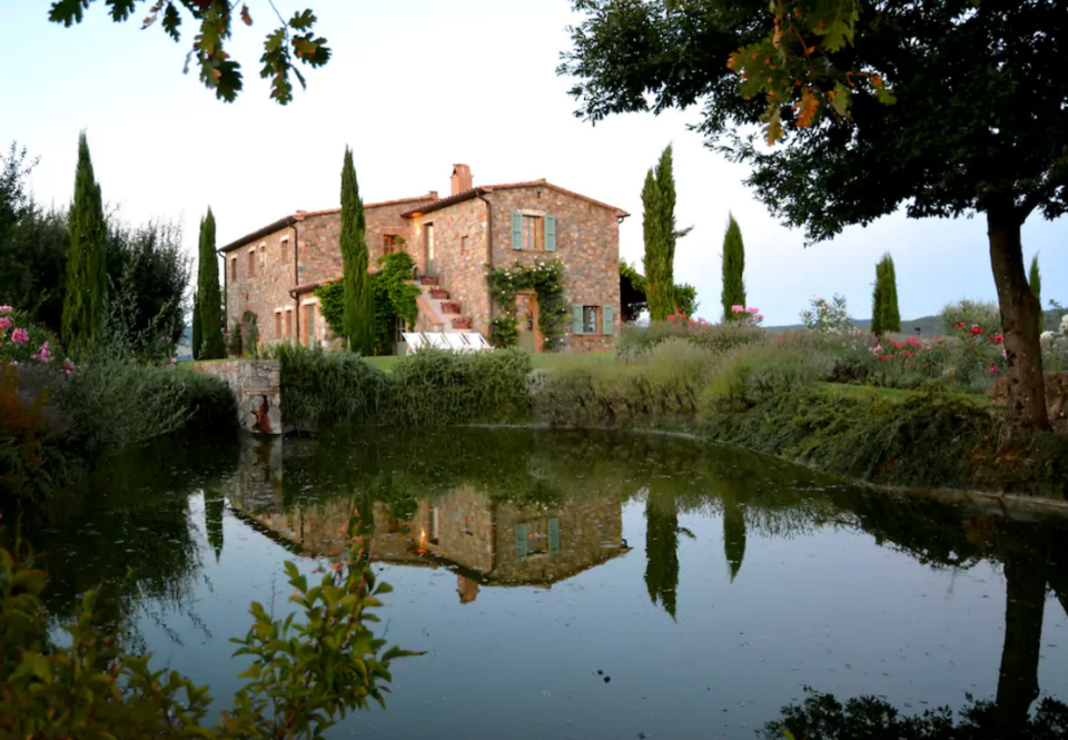 <p>The stunning home sits atop a hill giving it expansive views of the unspoiled Tuscan landscape and its oak woods, pastures, olive orchards and vineyards. (Airbnb) </p>