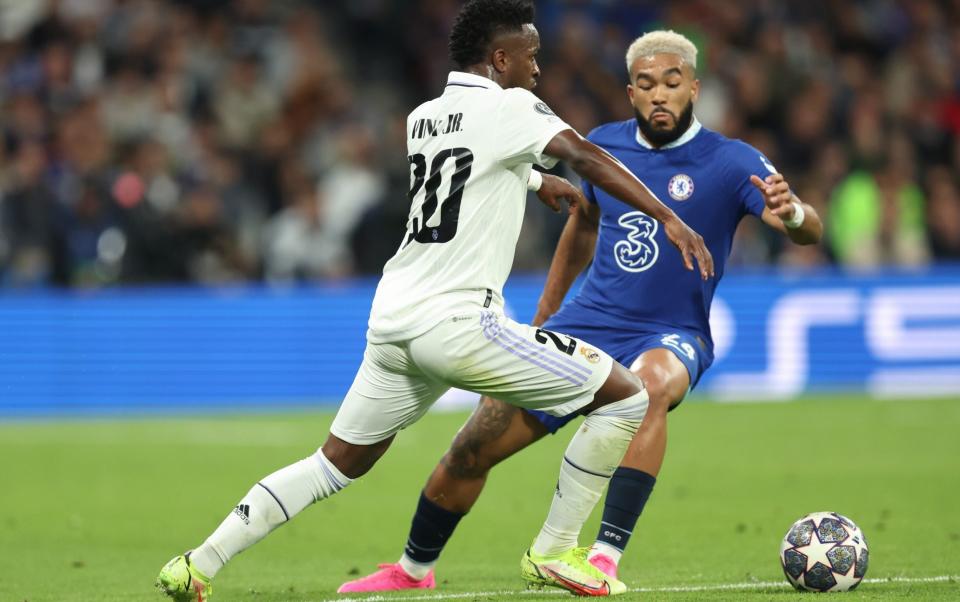 Vinicus Junior of Real Madrid and Reece James of Chelsea during the UEFA Champions League quarterfinal first leg match between Real Madrid and Chelsea FC at Estadio Santiago Bernabeu - Getty Images/James Williamson