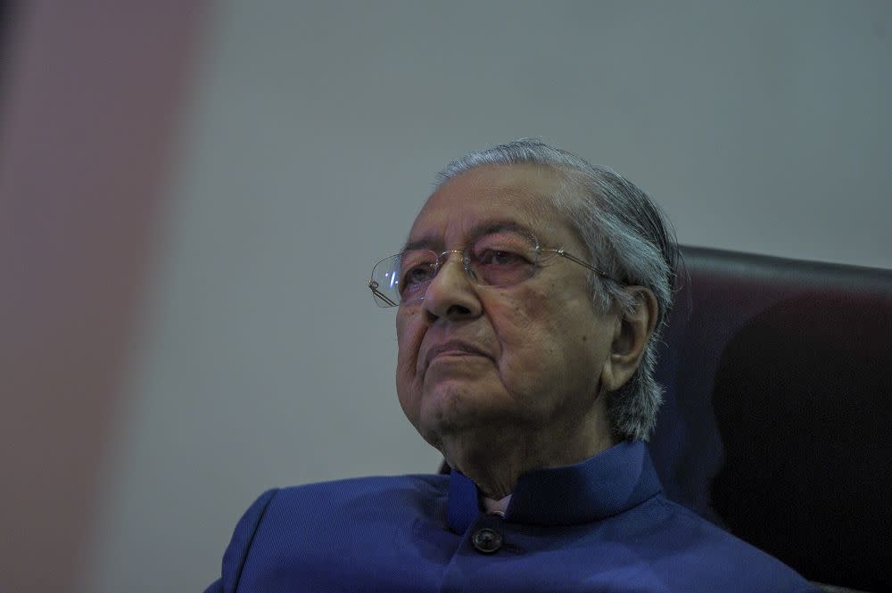 Tun Dr Mahathir Mohamad reacts during a media conference at the Pullman Kuala Lumpur in Bangsar August 7, 2020. — Picture by Shafwan Zaidon