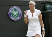 Petra Kvitova of the Czech Republic celebrates after winning her match against Kurumi Nara of Japan at the Wimbledon Tennis Championships in London, July 2, 2015. REUTERS/Henry Browne