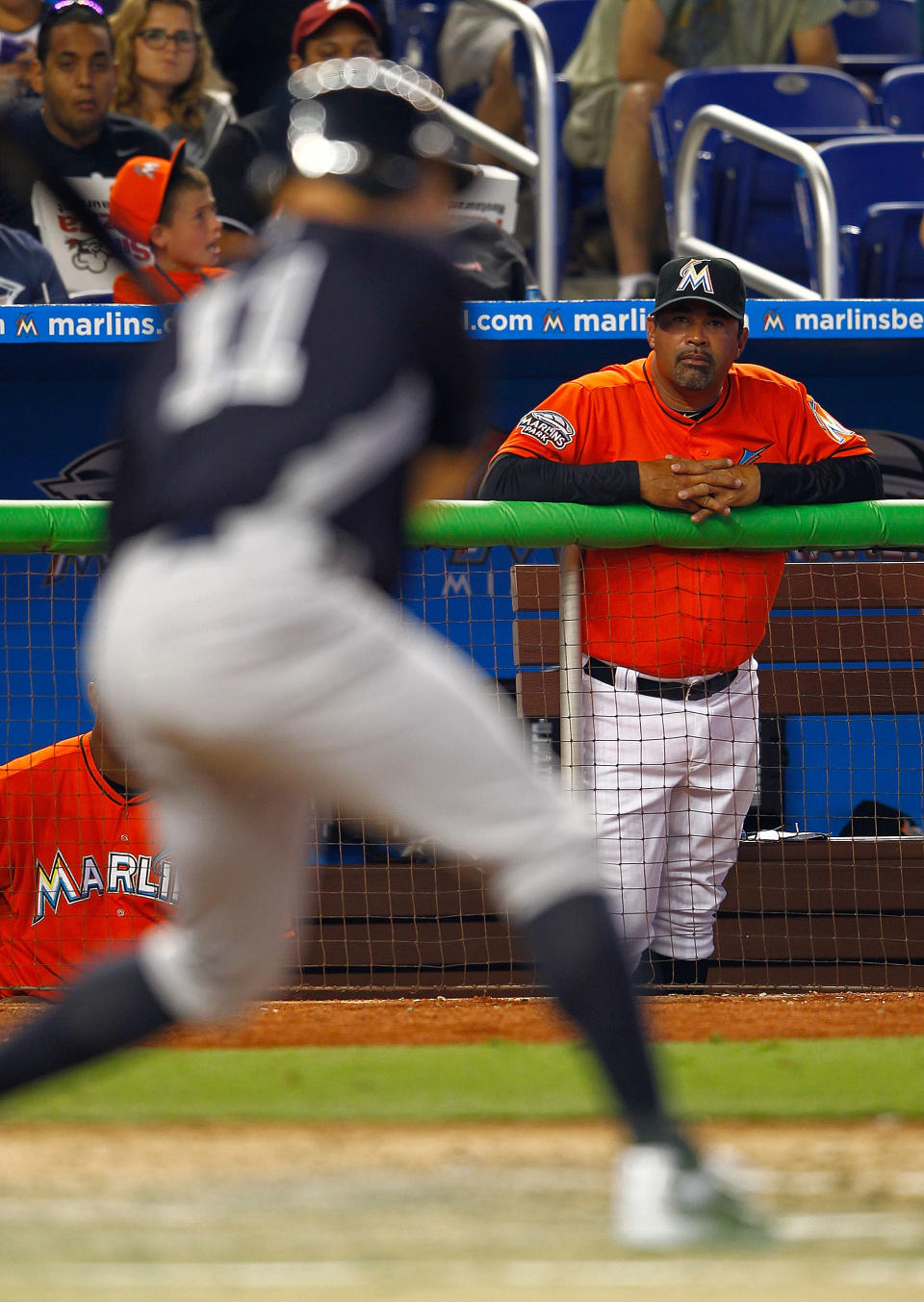 MIAMI, FL - APRIL 01: Manager Ozzie Guillen #13 of the Miami Marlins looks on during a game against the New York Yankees at Marlins Park on April 1, 2012 in Miami, Florida. (Photo by Mike Ehrmann/Getty Images)