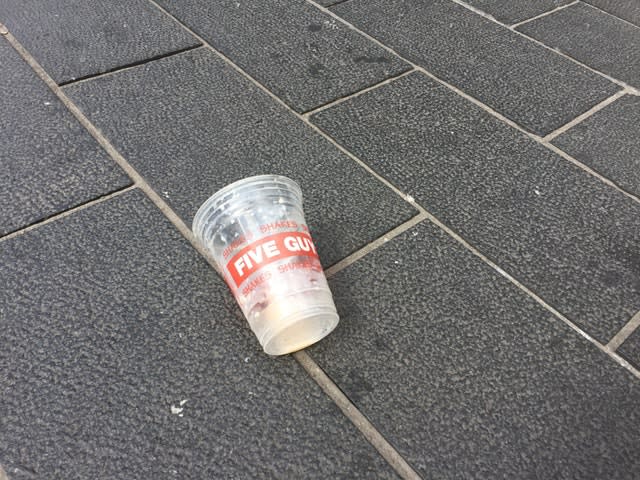 The empty milkshake cup from Five Guys