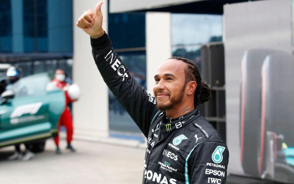 Mercedes' British driver Lewis Hamilton gives a thumbs up after the qualifying sessions at the Intercity Istanbul Park in Istanbul on October 9, 2021, ahead of the Formula One Grand Prix of Turkey - AFP