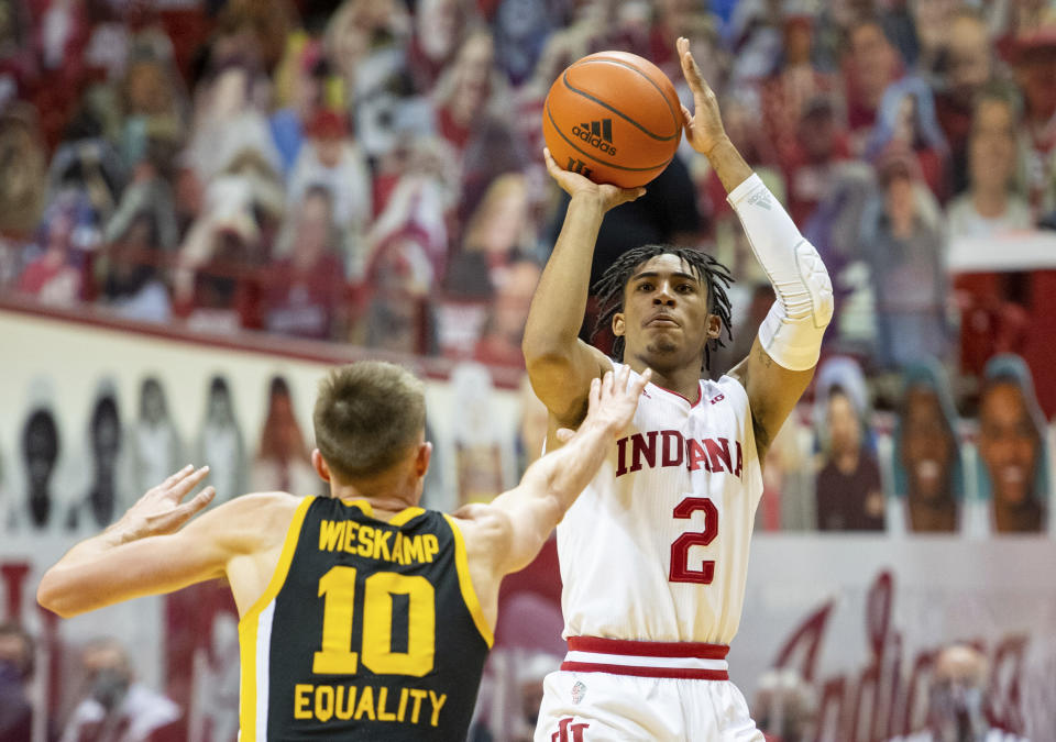 Indiana guard Armaan Franklin (2) shoots the winning basket during the second half of an NCAA college basketball game against Iowa, Sunday, Feb. 7, 2021, in Bloomington, Ind. (AP Photo/Doug McSchooler)