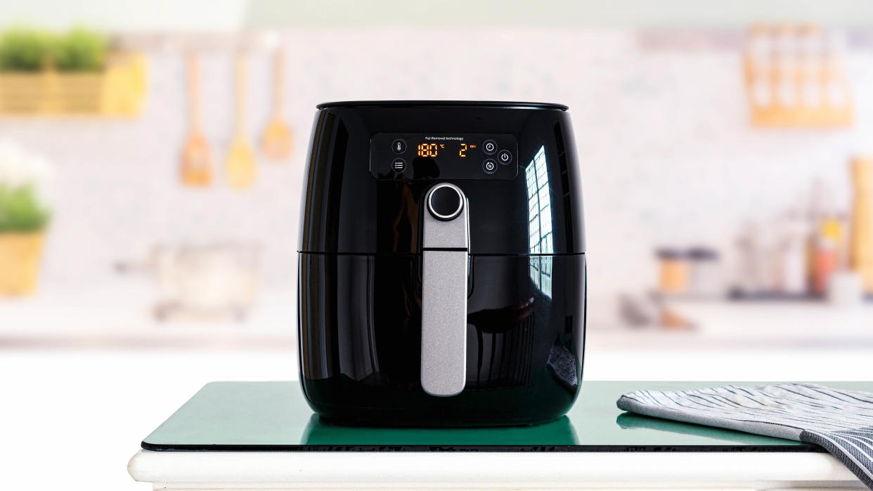  An air fryer in a kitchen. 