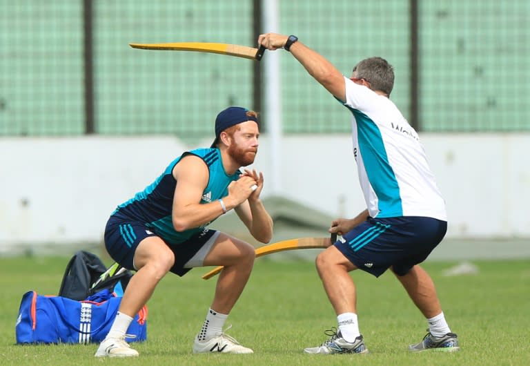 England cricket player Jonny Bairstow (L) takes part in a practice session at MA Aziz Stadium in Chittagong in Bangladesh