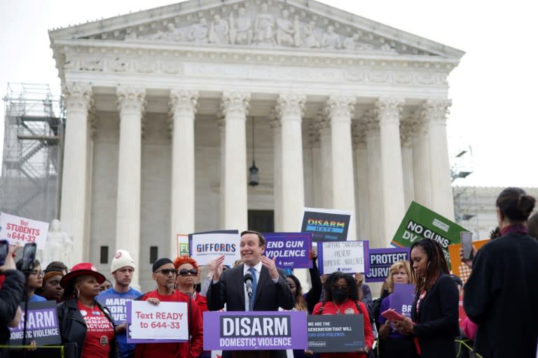 US Senator Chris Murphy speaks outside the Supreme Court as the justices weigh whether persons subject to a domestic violence restraining order should be prohibited from possessing a firearm (ALEX WONG)