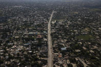 International Route Number 8, which connects Haiti with the Dominican Republic, is empty of large trucks as a result of a transportation strike in Croix-des-Bouquets, Haiti, Wednesday, Oct. 20, 2021. Workers angry about the nation’s lack of security are on strike in protest after 17 members of a U.S.-based missionary group were abducted by a violent gang on this road in Croix-des-Bouquets. (AP Photo/Matias Delacroix)