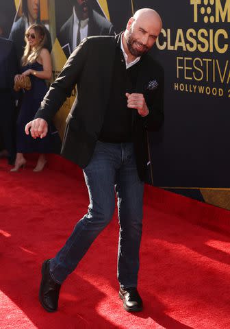 <p>Kayla Oaddams/FilmMagic</p> John Travolta attends the 30th anniversary screening of 'Pulp Fiction' in Los Angeles on April 18, 2024