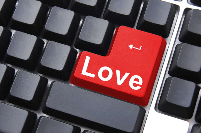 online love concept with colored button on computer keyboard
