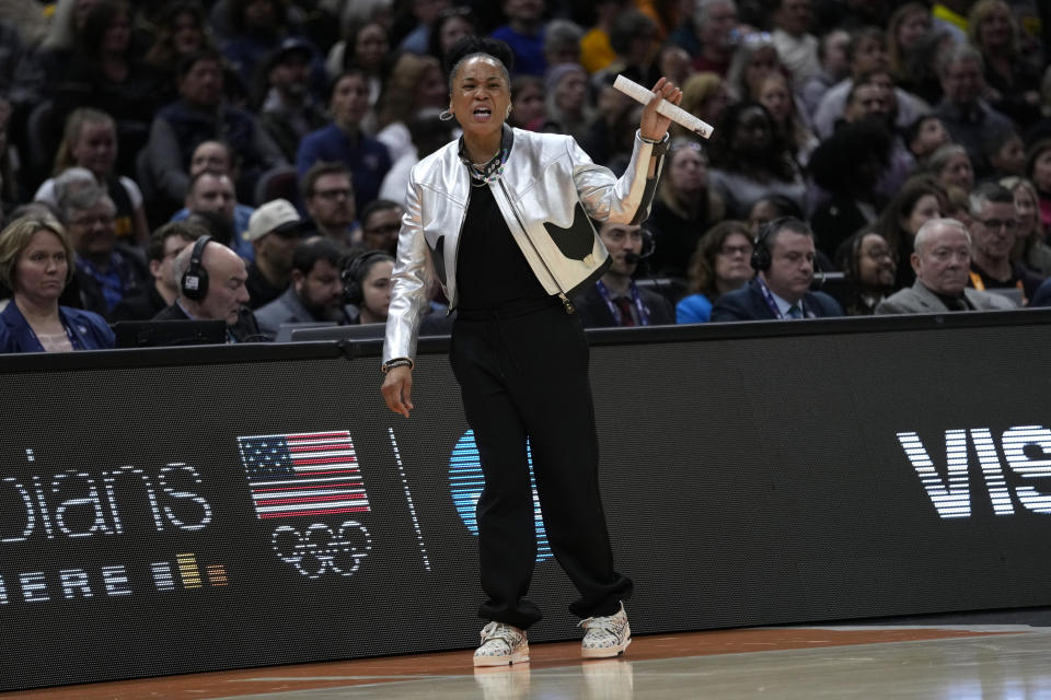 South Carolina head coach Dawn Staley reacts to a call during the first half of the Final Four college basketball championship game against Iowa in the women's NCAA Tournament, Sunday, April 7, 2024, in Cleveland. (AP Photo/Carolyn Kaster)