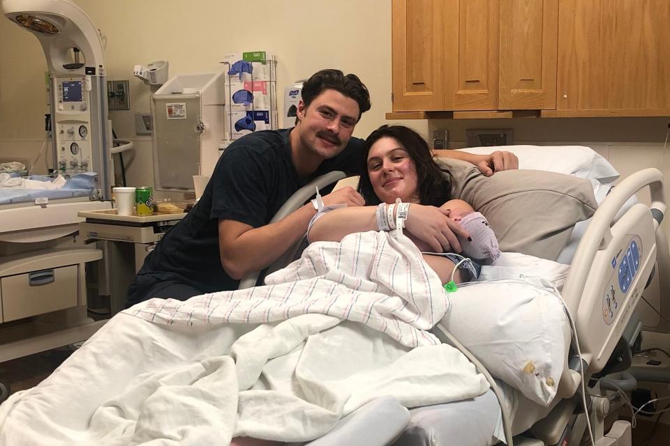 New Year's baby Maveric James Singleton with parents Rylie Stege (right) and Christian Singleton (left) on Jan 1. 2024. Maveric was born at 12:03 a.m.