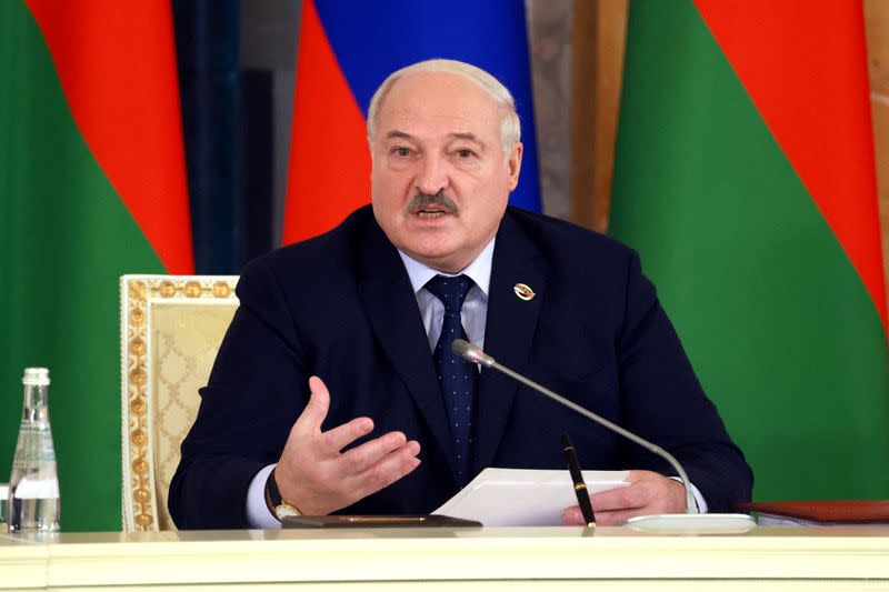 FILE PHOTO: Russian President Putin and Belarusian President Lukashenko chair Union State's Council meeting in St Petersburg