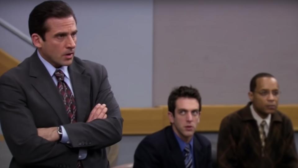 Michael Scott giving a lecture in The Office