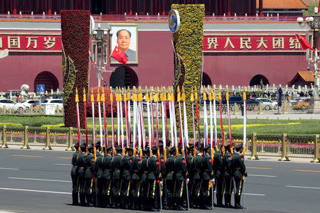 Honour guards prepare for the welcome ceremony of Mongolian President Khaltmaagiin Battulga (not pictured) at the Great Hall of People in Beijing, China, April 25, 2019. Kenzaburo Fukuhara/Pool via REUTERS