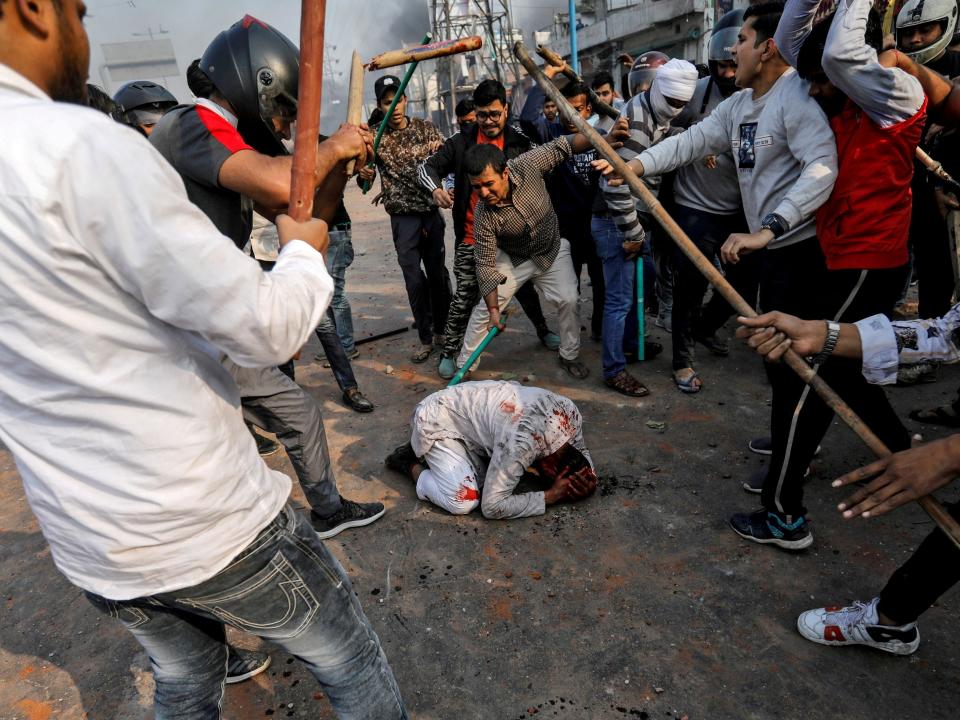 A group of men chanting pro-Hindu slogans, beat Mohammad Zubair, 37, who is Muslim, during protests sparked by a new citizenship law in New Delhi, India, February 24, 2020.