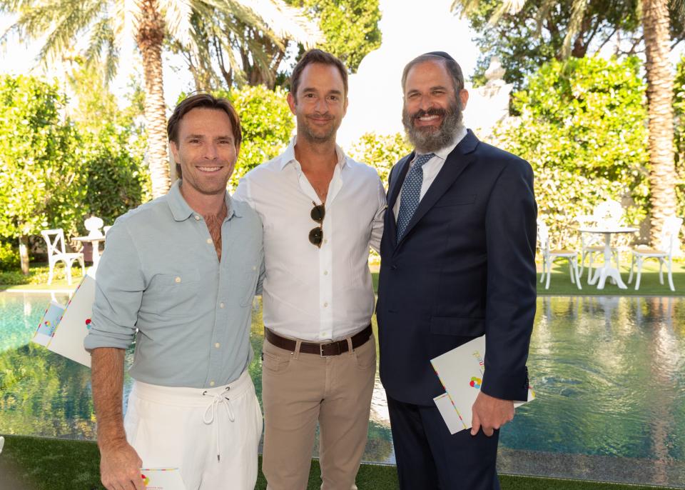 Adam Rodman, Russell Hoffman and Rabbi Moshe Scheiner (from left) attend a cocktail reception April 17 at the home of Ken Endelson to benefit Palm Beach Synagogue's Project Connect.