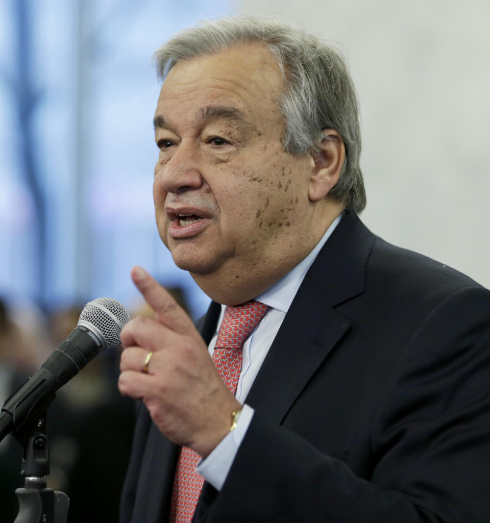 United Nations Secretary-General Antonio Guterres talks with members of the U.N. staff at U.N. headquarters, Tuesday, Jan. 3, 2017. (AP Photo/Seth Wenig)