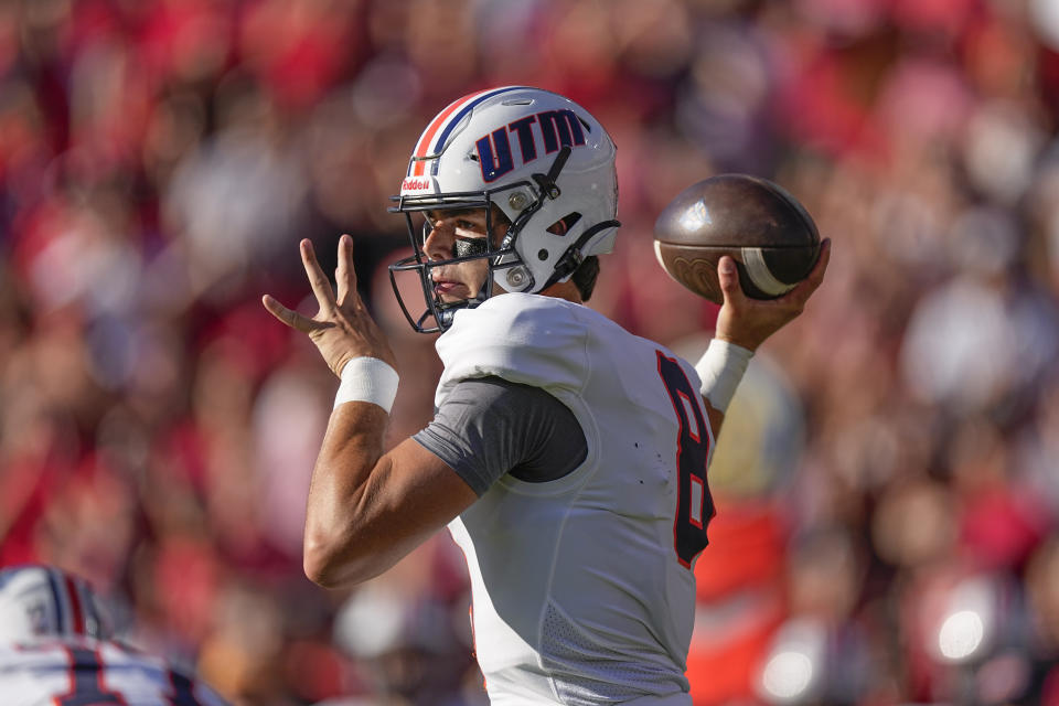 Tennessee-Martin quarterback Kinkead Dent (8) throws a pass during the first half of an NCAA college football game against the Georgia, Saturday, Sept. 2, 2023, in Athens, Ga. (AP Photo/John Bazemore)