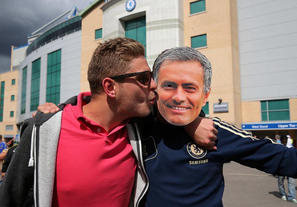 A Chelsea fan with a Jose Mourinho mask outside of Stamford Bridge.