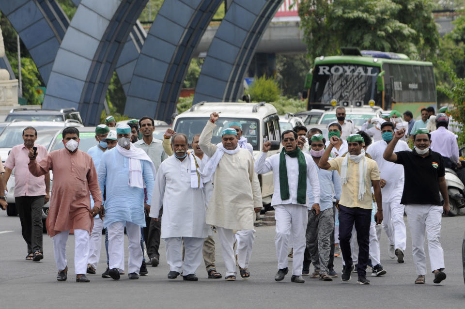 Members of the Bharatiya Kisan Union protesting at Sector 14A Noida Delhi border where the police placed barricades to stop them from proceeding towards Azadpur Mandi on September 23, 2020 in Noida, India. (Photo by Sunil Ghosh/Hindustan Times via Getty Images)