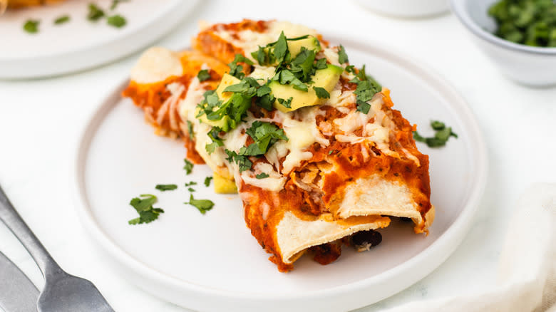 A portion of enchiladas on a plate