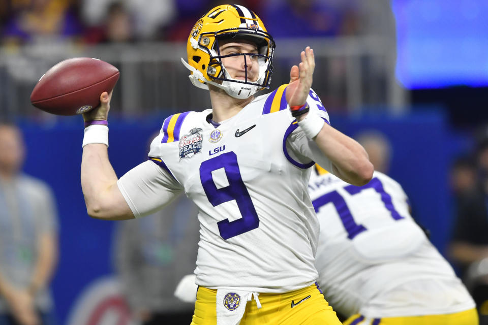 FILE - In this Dec. 28, 2019, file photo, LSU quarterback Joe Burrow (9) works against Oklahoma during the first half of the Peach Bowl NCAA semifinal college football playoff game, in Atlanta. LSU’s Joe Burrow and Justin Jefferson were easy selections for The Associated Press all-bowl team. The two connected for four first-half touchdowns in a College Football Playoff semifinal blowout of Oklahoma. (AP Photo/John Amis, File)