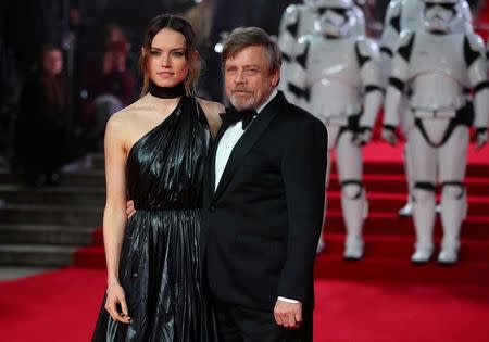 FILE PHOTO: Actors Daisy Ridley and Mark Hamill pose for photographers as they arrive for the European Premiere of 'Star Wars: The Last Jedi', at the Royal Albert Hall in central London, Britain December 12, 2017. REUTERS/Hannah McKay/File Photo