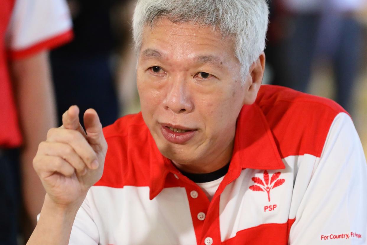 FILE PHOTO:  Lee Hsien Yang, the son of the late Lee Kuan Yew and the younger brother of Singapore Prime Minister, Lee Hsien Loong, joins the Progress Singapore Party (PSP) walkabout, led by party chief, Dr Tan Cheng Bock on June 24, 2020 in Singapore. Today, Lee Hsien Yang has formally joined the PSP, an opposition party to 'compete' against his brother in the forthcoming election after a long standing family feud between the two brothers about their late father's house. On June 23, Prime Minister Lee Hsien Loong has called for the General Election to be held on July 10 to seek a fresh mandate amid the coronavirus (COVID-19) pandemic. As of June 23, the total number of COVID-19 cases in the country stands at 42,432.  (Photo by Suhaimi Abdullah/Getty Images)