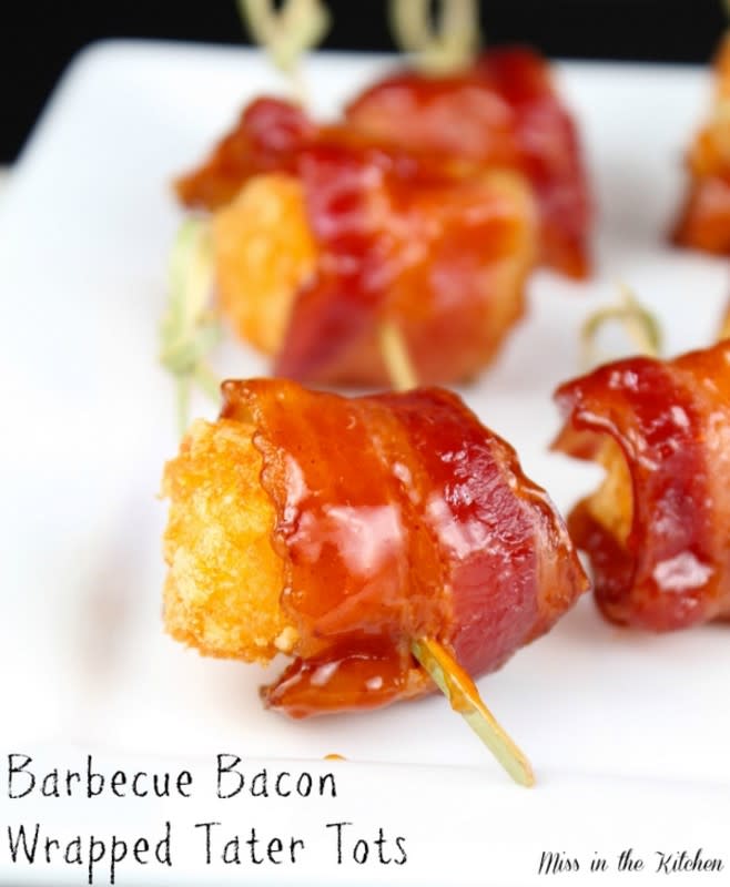 <p>Miss In The Kitchen</p><p>Sweet barbecued bacon wrapped around a crunchy tater tot, so simple and irresistible.</p><p><strong>Get the recipe: <a href="https://www.missinthekitchen.com/barbecue-bacon-wrapped-tater-tots/" rel="nofollow noopener" target="_blank" data-ylk="slk:Barbecue Bacon Wrapped Tater Tots;elm:context_link;itc:0;sec:content-canvas" class="link ">Barbecue Bacon Wrapped Tater Tots</a></strong></p><p><strong>Related: <a href="https://www.yahoo.com/lifestyle/30-best-tater-tot-recipes-141720231.html" data-ylk="slk:30 Best Tater Tot Recipes;elm:context_link;itc:0;sec:content-canvas;outcm:mb_qualified_link;_E:mb_qualified_link;ct:story;" class="link  yahoo-link">30 Best Tater Tot Recipes</a></strong></p>