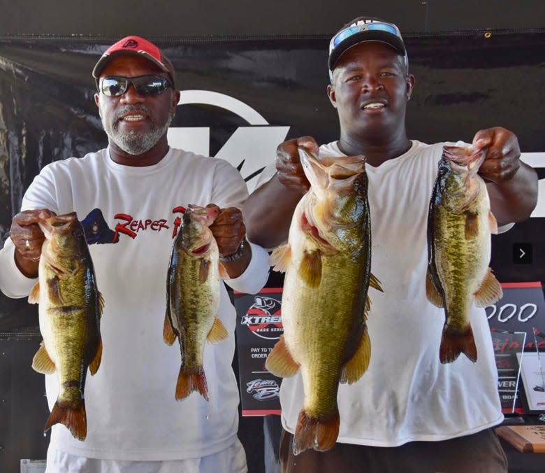 Michael Porter, left, and Chris Maxwell had 40.19 pounds to win the Xtreme Bass Series State Championship tournament Nov. 4-5 on Lake Okeechobee along with the grand prize of a 2022 Blazer 595 Pro Elite bass boat valued at $55,000.