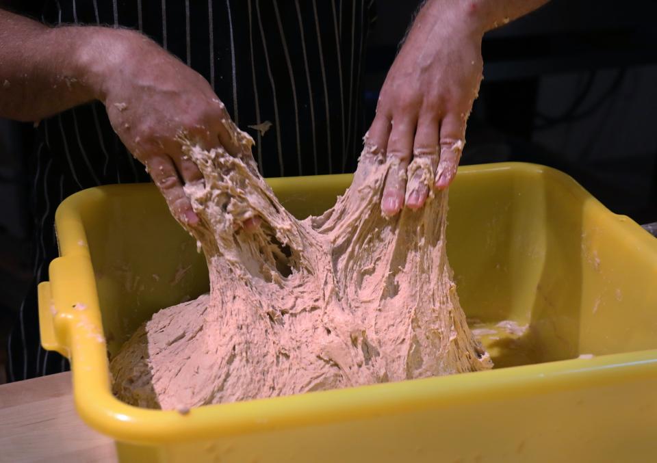 The dough at Wildflour in North Winton Village starts out sticky because of the use of whole grains. Over time, it becomes smooth and elastic.