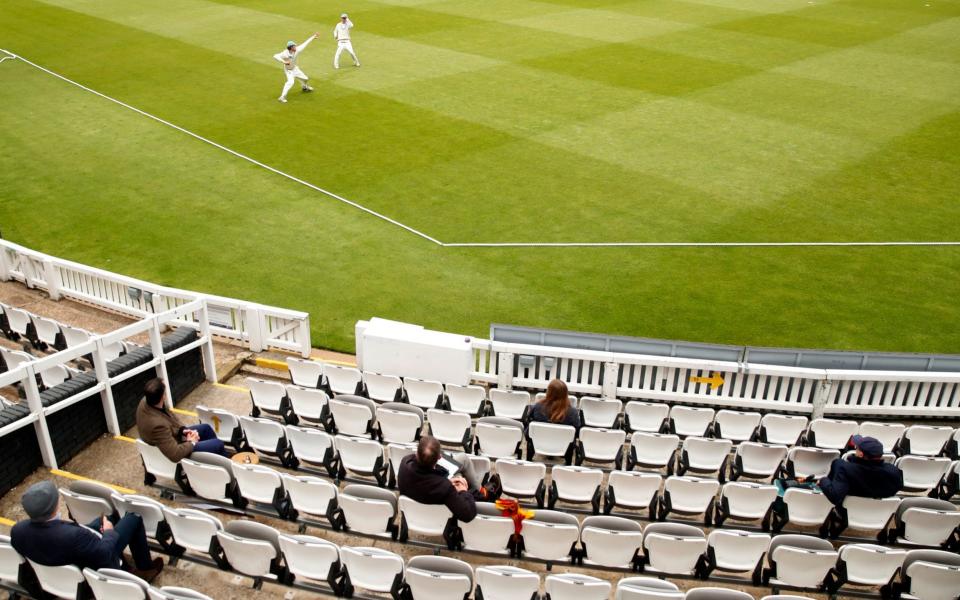  General view during the match, as a limited number of fans are permitted at outdoor sports venues  - Reuters