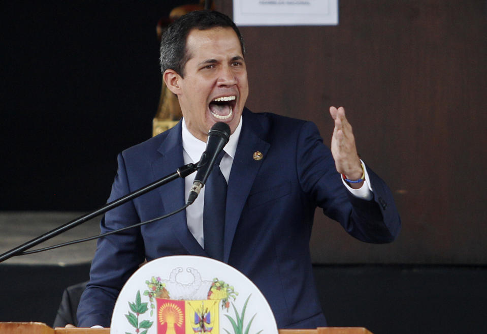 Opposition leader and self-proclaimed interim president of Venezuela Juan Guaido speaks during a session in a main square in Caracas, Venezuela, Tuesday, July 23, 2019. The opposition-led congress held the session to try to keep pressure on the government of President Nicolás Maduro, who has defied U.S.-led efforts to oust him. Guaido said, as he often has in the past, that the government he calls a "dictatorship" is crumbling. (AP Photo/Leonardo Fernandez)