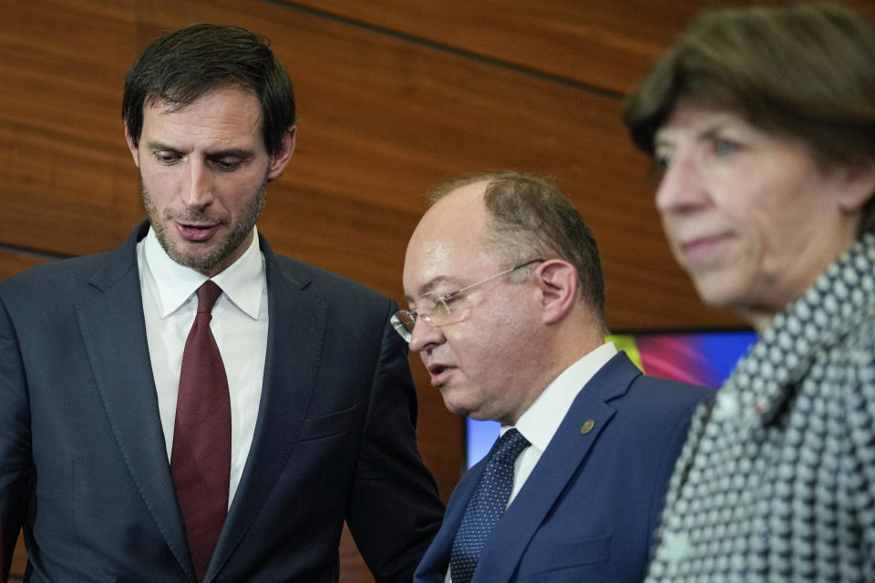 French Foreign Minister Catherine Colonna, right, and Dutch Foreign Minister Wopke Hoekstra, left, walk with Romanian counterpart Bogdan Aurescu after joint press statements at the Romanian foreign ministry in Bucharest, Romania, Friday, Jan. 27, 2023. (AP Photo/Andreea Alexandru)