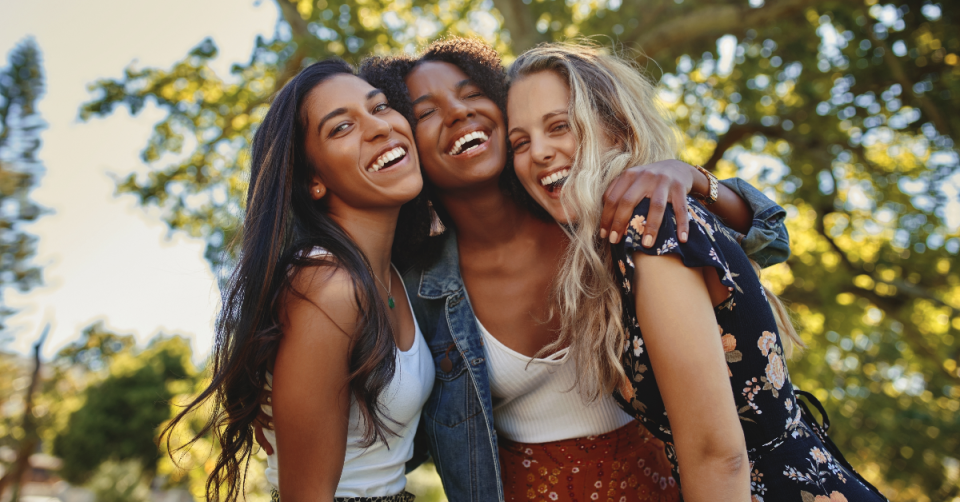 Happy friends laughing