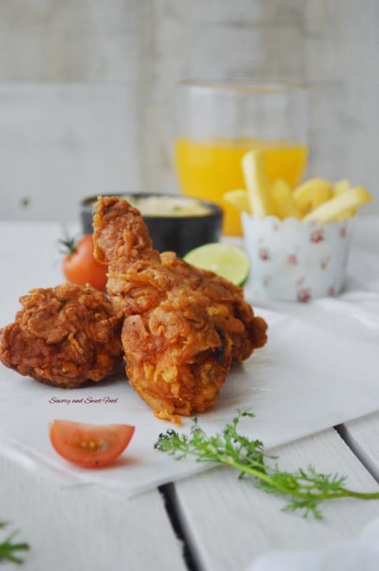 <p>Savory and Sweet Food</p><p>Don’t be running to KFC for your fried chicken fix: here’s a fool-proof, Indian spiced Tandoori fried chicken recipe with honey garlic aioli dipping sauce. </p><p><strong>Get the recipe: <a href="http://savoryandsweetfood.com/2015/09/17/tandoori-fried-chicken-with-honey-garlic-aioli/" rel="nofollow noopener" target="_blank" data-ylk="slk:Tandoori Fried Chicken With Honey-Garlic Aioli;elm:context_link;itc:0;sec:content-canvas" class="link rapid-noclick-resp">Tandoori Fried Chicken With Honey-Garlic Aioli</a></strong></p>