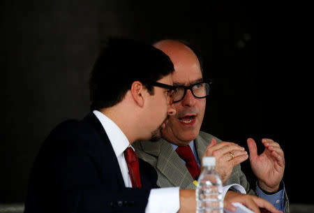 Julio Borges, (R) president of the National Assembly and deputy of the Venezuelan coalition of opposition parties (MUD) and Freddy Guevara, first Vice-President of the National Assembly, attend a session of Venezuela's opposition-controlled National Assembly to appoint new magistrates of the Supreme Court in Caracas, Venezuela, July 21, 2017. REUTERS/Carlos Garcia Rawlins
