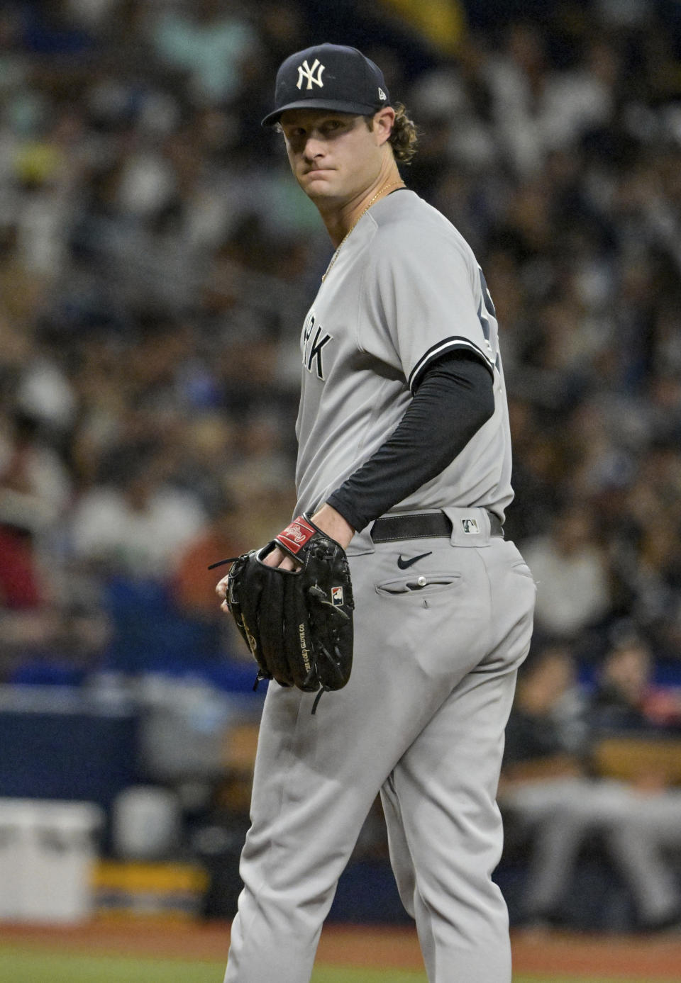 New York Yankees starter Gerrit Cole checks a baserunner during the fifth inning of a baseball game against the Tampa Bay Rays, Monday, June 20, 2022, in St. Petersburg, Fla. (AP Photo/Steve Nesius)