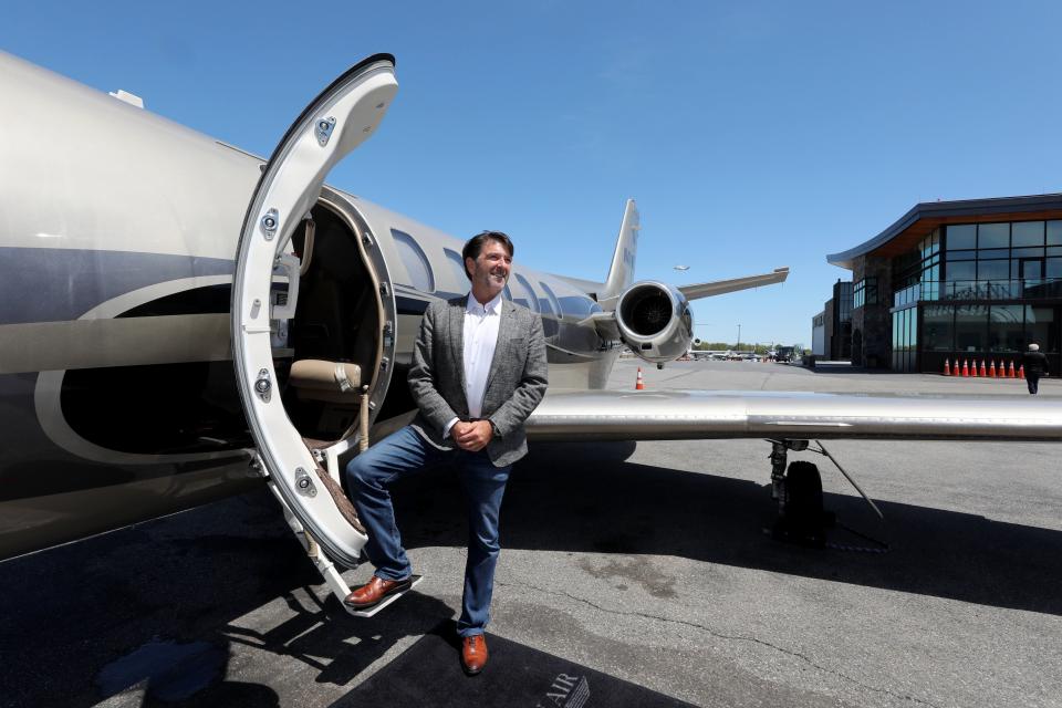 Roger Woolsey, the CEO of Million Air, is pictured with his Cessna Citation SII aircraft, outside of the FBO (Fixed Base Operator) at the Westchester County Airport in Harrison, May 6, 2021.